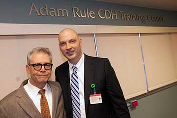 Adam with Dr. Curtis Lowery at the dedication of the Adam Rule CDH Training Center.